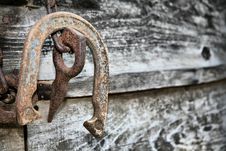Old Rusted Horseshoe And Log Splitter Stock Photo Old Rusted Horseshoe And Log Splitter Stock Photo