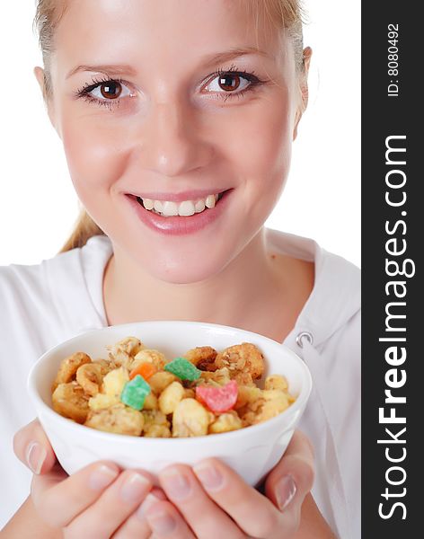 Portrait of young woman with plate of muesli. Portrait of young woman with plate of muesli