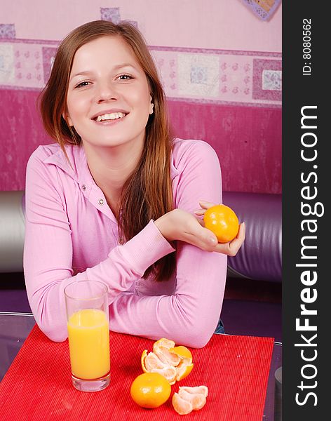 Woman drinking orange fresh juice. Woman drinking orange fresh juice