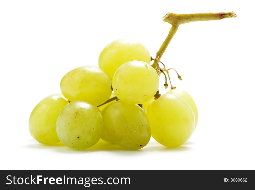 A small cluster of green grapes isolated on a white background.