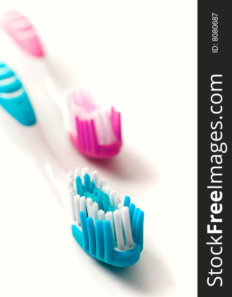 Two toothbrushes on white background