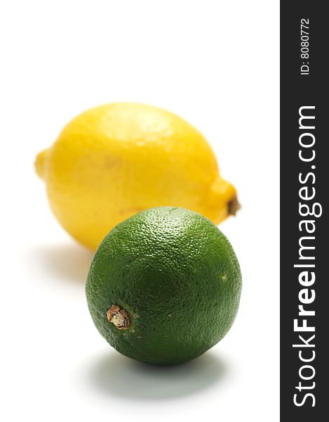 Yellow lemon and green lime isolated on a white background. Yellow lemon and green lime isolated on a white background.