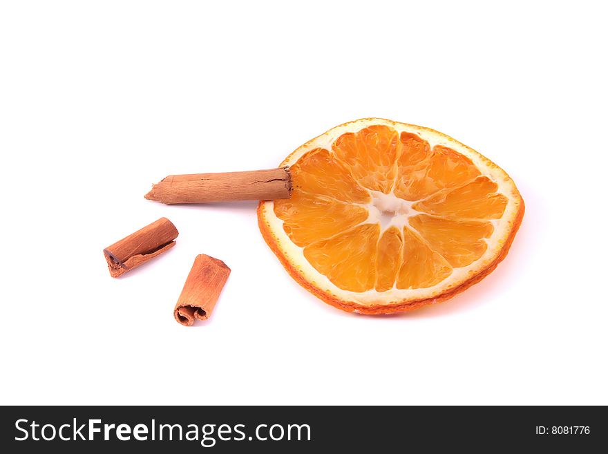 Dried orange section and cinnamon. Dried orange section and cinnamon