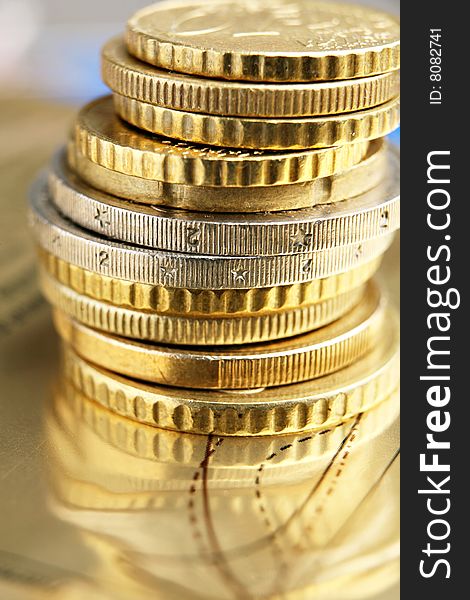 Pile of euro coins on golden background. Pile of euro coins on golden background.