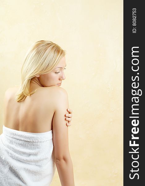 The rear view of the blonde in a towel. The rear view of the blonde in a towel