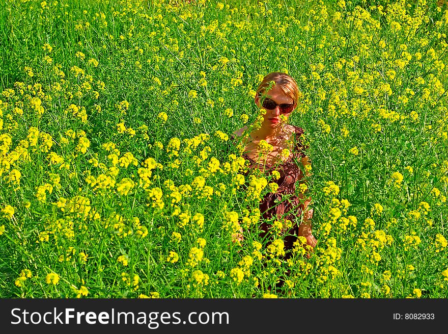 Woman In The Yellow Flowers Field