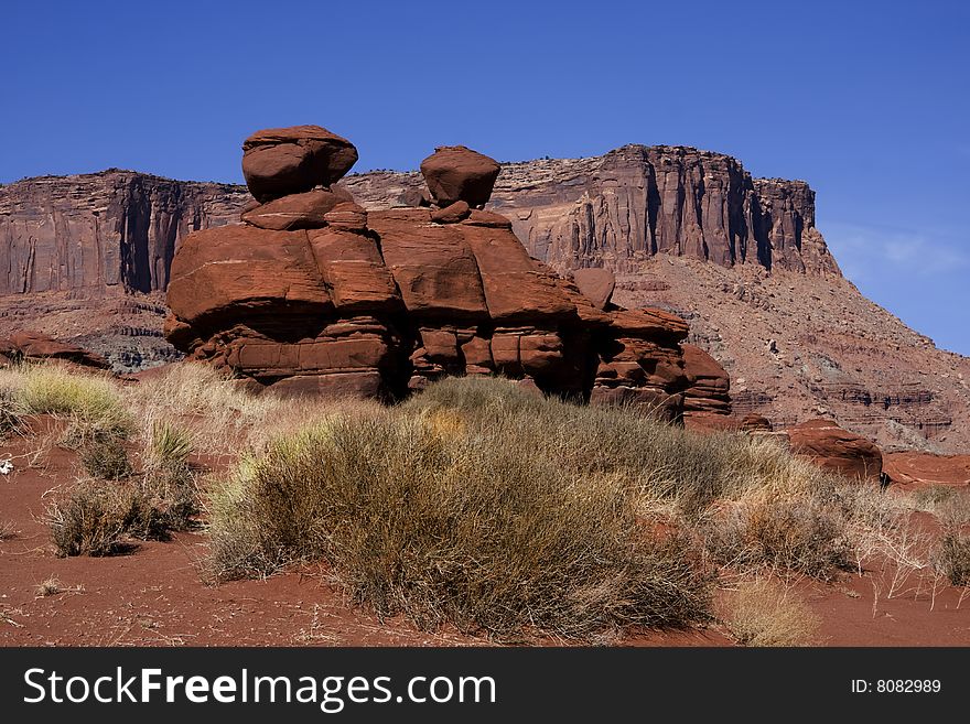 View of the red rock formations in Canyonlands National Park with blue skyï¿½