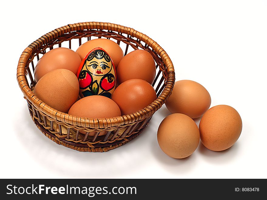 Easter egg in wooden basket