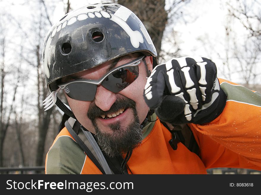 Smiling biker in black helmet