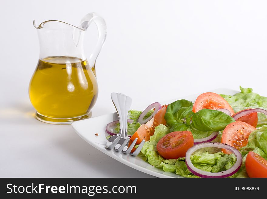 Healthy salad with lettuce, tomato, onion