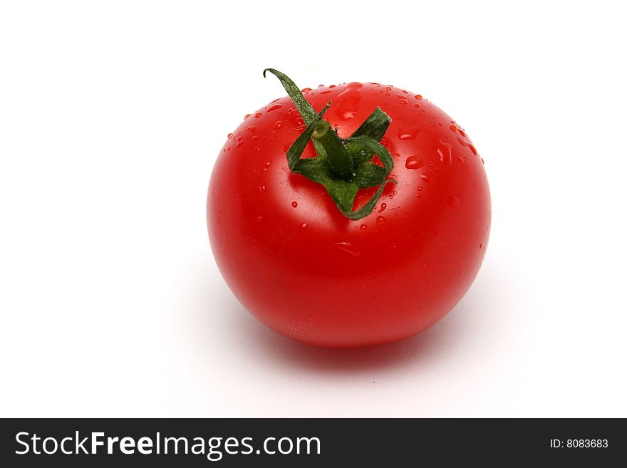 Red yellow and green peppers. Focus is on the red one.