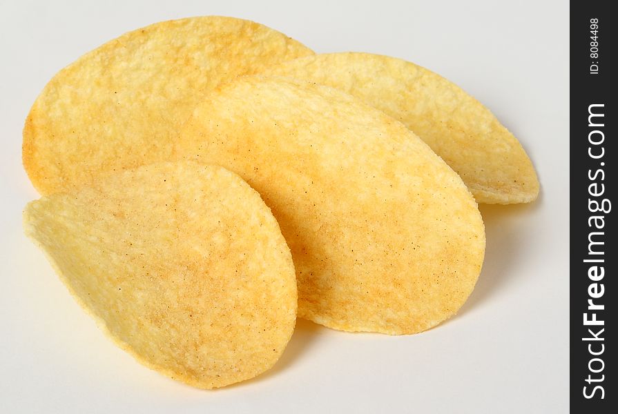 Potato chips, three fat, crackling slices.