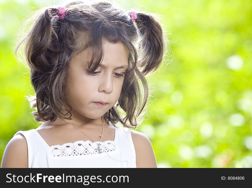 Portrait of little girl having good time in summer environment. Portrait of little girl having good time in summer environment