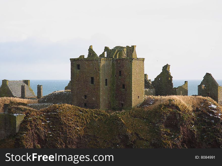 Dunnottar Castle with snow on the ground, Scotland. Dunnottar Castle with snow on the ground, Scotland
