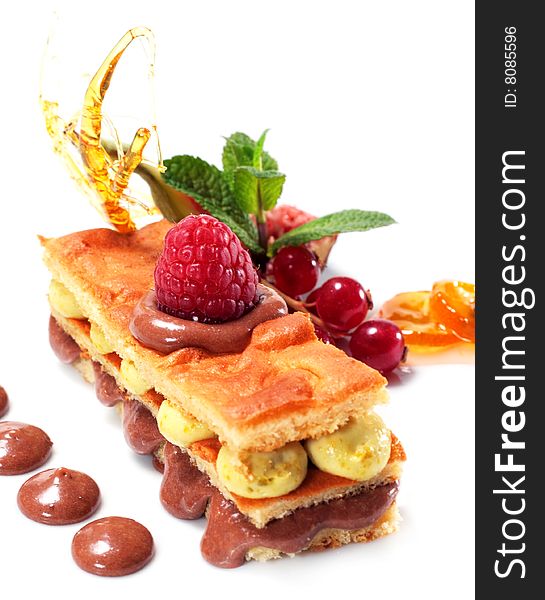 Sponge Cake with Chocolate and Pistachio Mousse and Fresh Berries