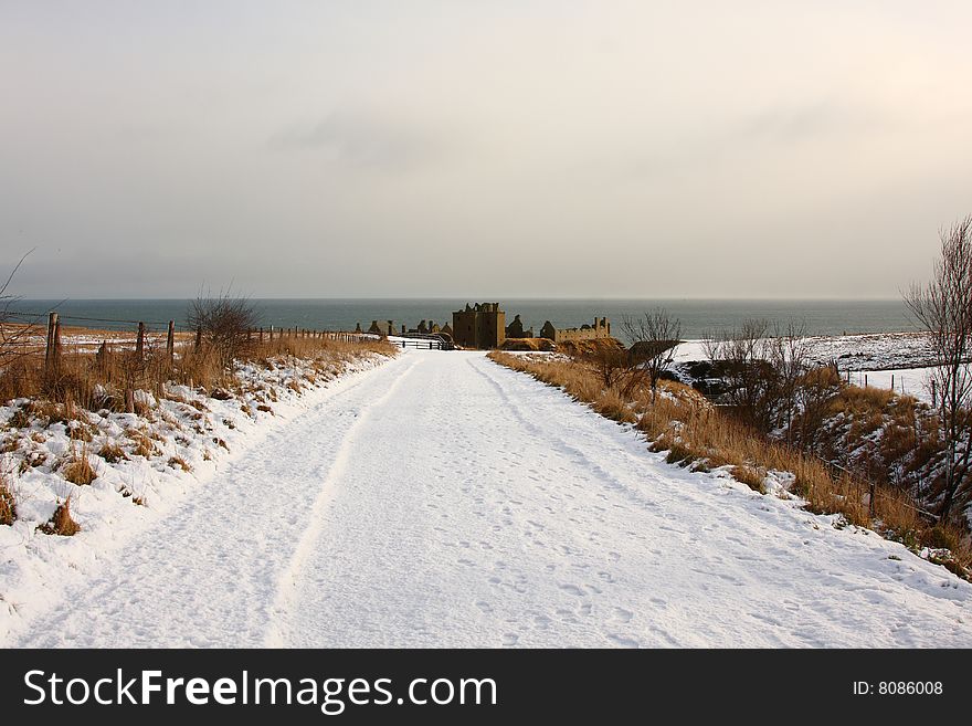 Dunnottar Castle with snow on the ground, Scotland. Dunnottar Castle with snow on the ground, Scotland