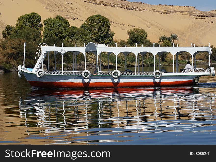 Motor boat on the river Nile side
