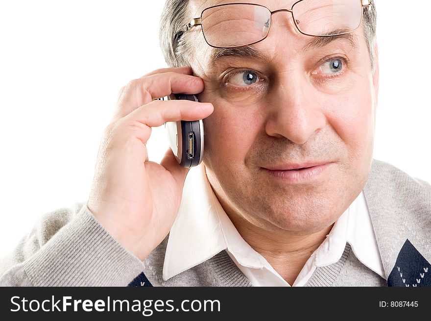 Senior man talking on mobile phone (isolated on white)