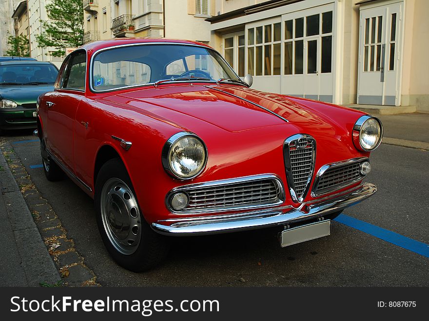 Red vintage car on the street in Zurich