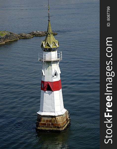 Lighthouse at the entrance to the harbor in Oslo, Norway. Lighthouse at the entrance to the harbor in Oslo, Norway