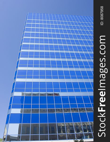 Modern office building, vertical, blue sky and building. Modern office building, vertical, blue sky and building