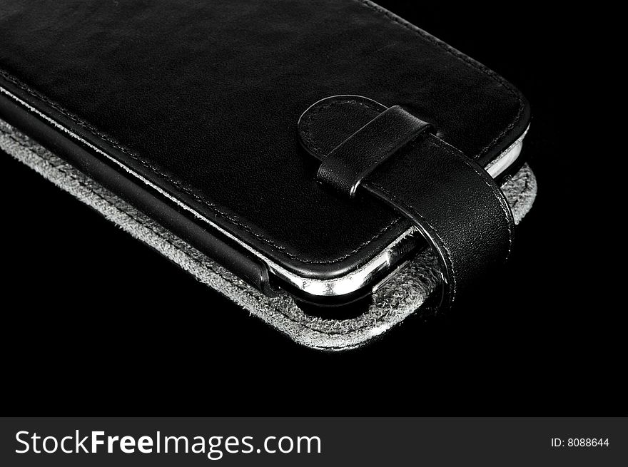 Modern smartphone in black leather case. Modern smartphone in black leather case