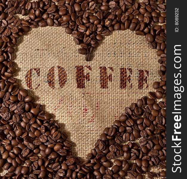 Heart shape made from coffee beans