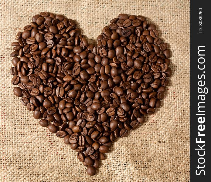 Heart shape made from coffee beans