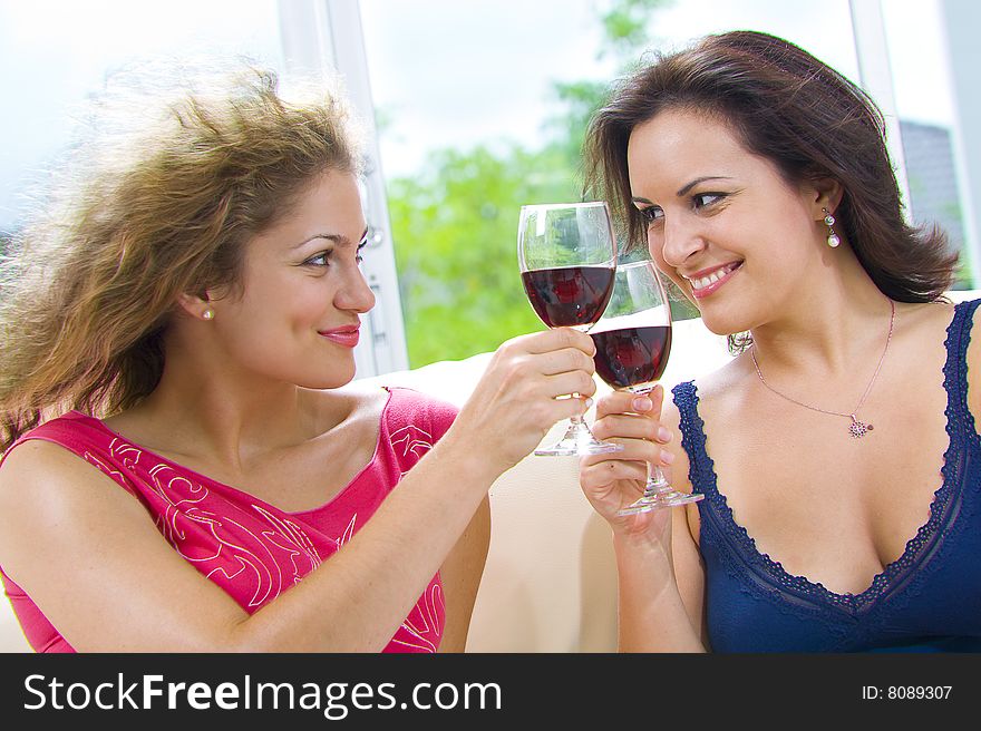 Portrait of two young attractive girls having good time. Portrait of two young attractive girls having good time