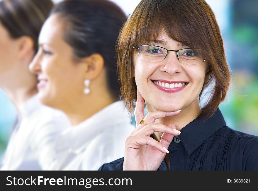 Portrait of young pretty woman in business environment. Portrait of young pretty woman in business environment