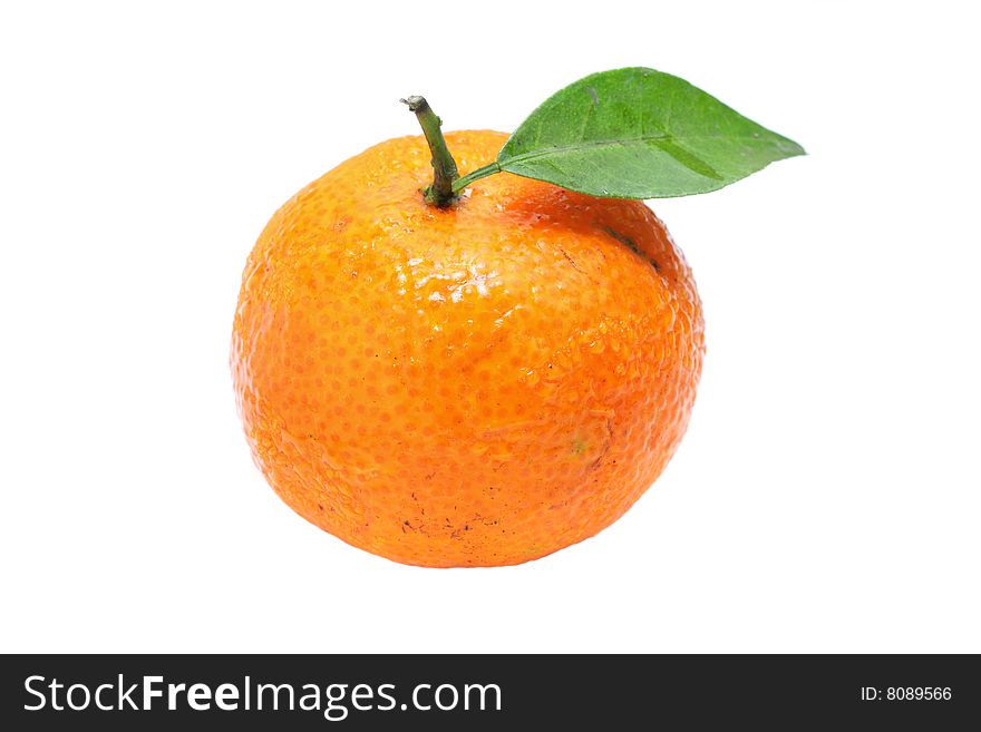 Close up of a mandarin orange isolated over white background.