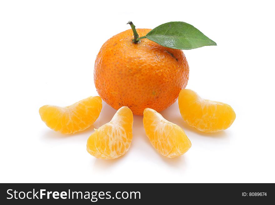 Close up of mandarin oranges isolated over white background.