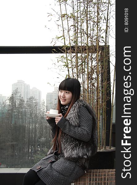 Beautiful asia woman with a cup of tea.