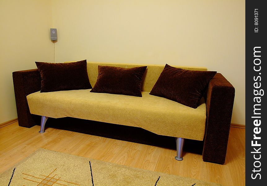 Yellow, brown, modern sofa