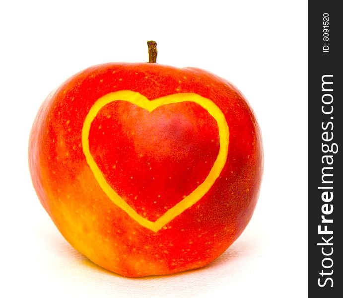 The image of the apple on which heart is cut out. The image of the apple on which heart is cut out