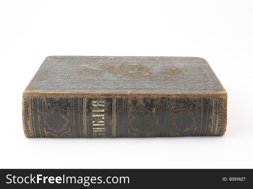 Antique bible on white background