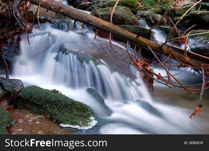 Mountain brook in the autumn landscape. Mountain brook in the autumn landscape