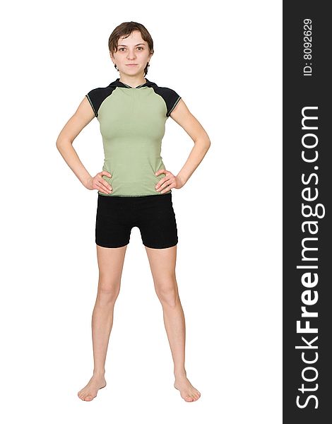 Young slim woman making fitness exercises isolated at the white background. Young slim woman making fitness exercises isolated at the white background