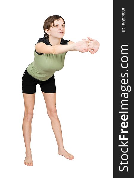 Young slim woman making fitness exercises isolated at the white background. Young slim woman making fitness exercises isolated at the white background