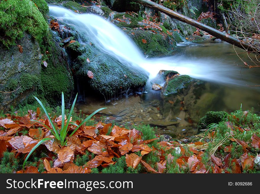 Mountain brook in the autumn landscape. Mountain brook in the autumn landscape