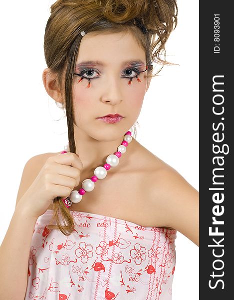 Closeup of young fashion girl with special eye makeup showing jewelry and pink white clothes. Closeup of young fashion girl with special eye makeup showing jewelry and pink white clothes