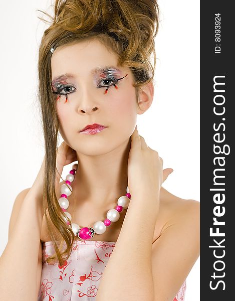 Closeup of young fashion girl with special eye makeup showing jewelry. Closeup of young fashion girl with special eye makeup showing jewelry