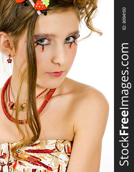 Closeup of young fashion girl with special eye makeup and red necklace. Closeup of young fashion girl with special eye makeup and red necklace