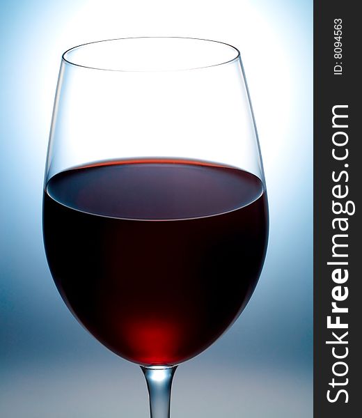 Glass filled with red wined with red wine