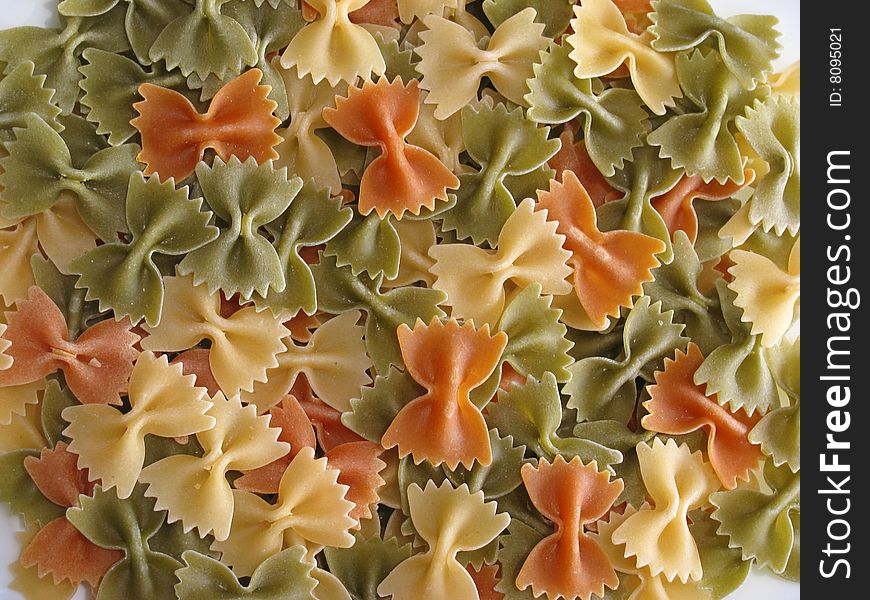 Large group of colorful macaroni isolated in studio