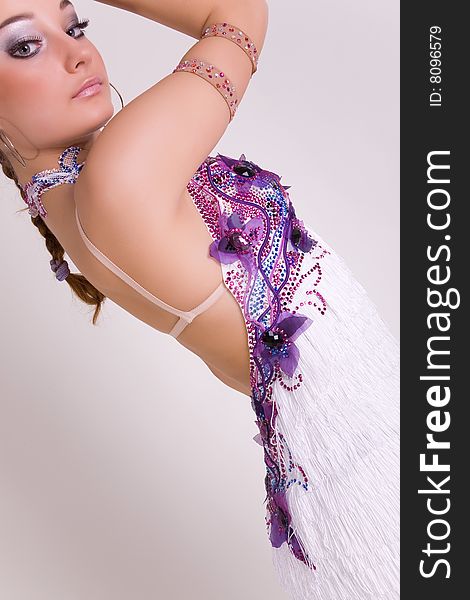 Close-up of professional dancer girl, studio shot