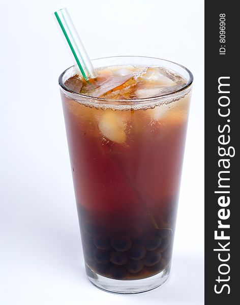 Glass of bubble black tea with tapioca