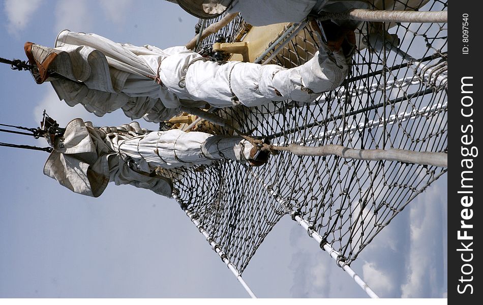 Convolute sails of sailship World at the embankment river Neva