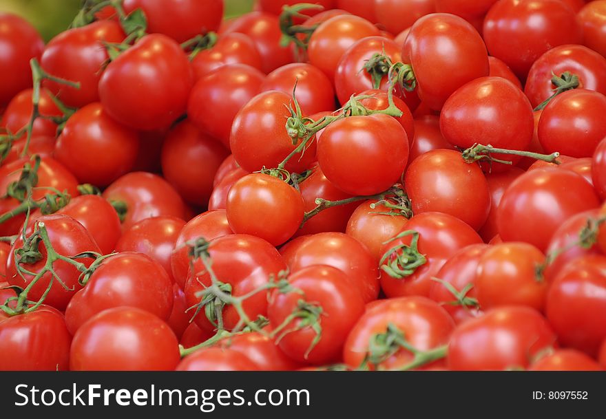Shiny fresh looking pile of tomatoes. Shiny fresh looking pile of tomatoes