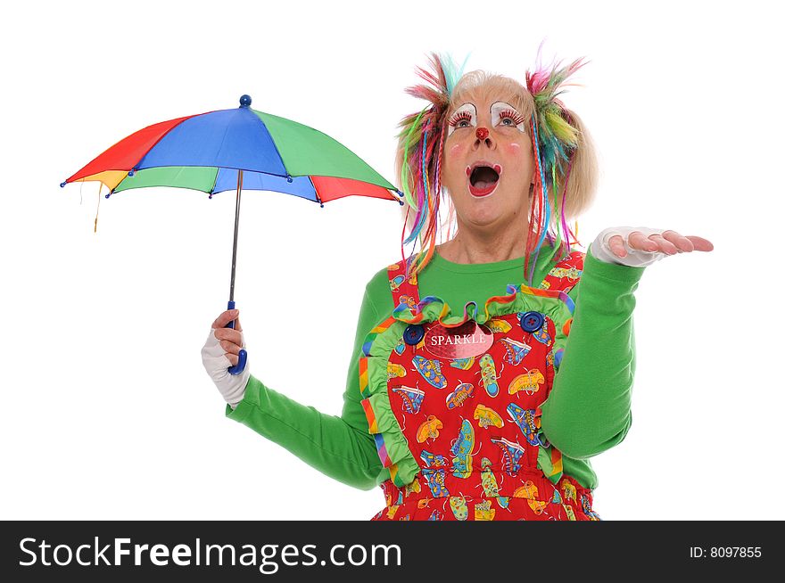 Clown's portrait holding umbrella against a white background